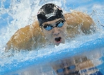 155218_l-americain-michael-phelps-dans-la-finale-du-100-m-papillon-aux-mondiaux-de-natation-a-shanghai-le-31-juillet-2011